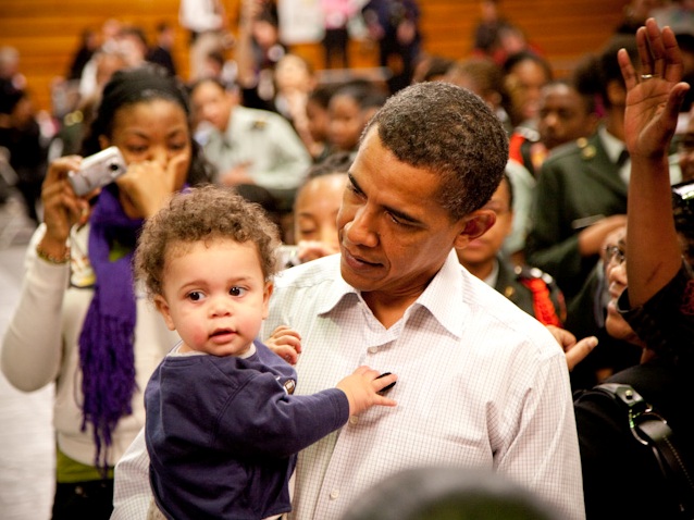 President Obama checks a small child for signs of cyber-infection