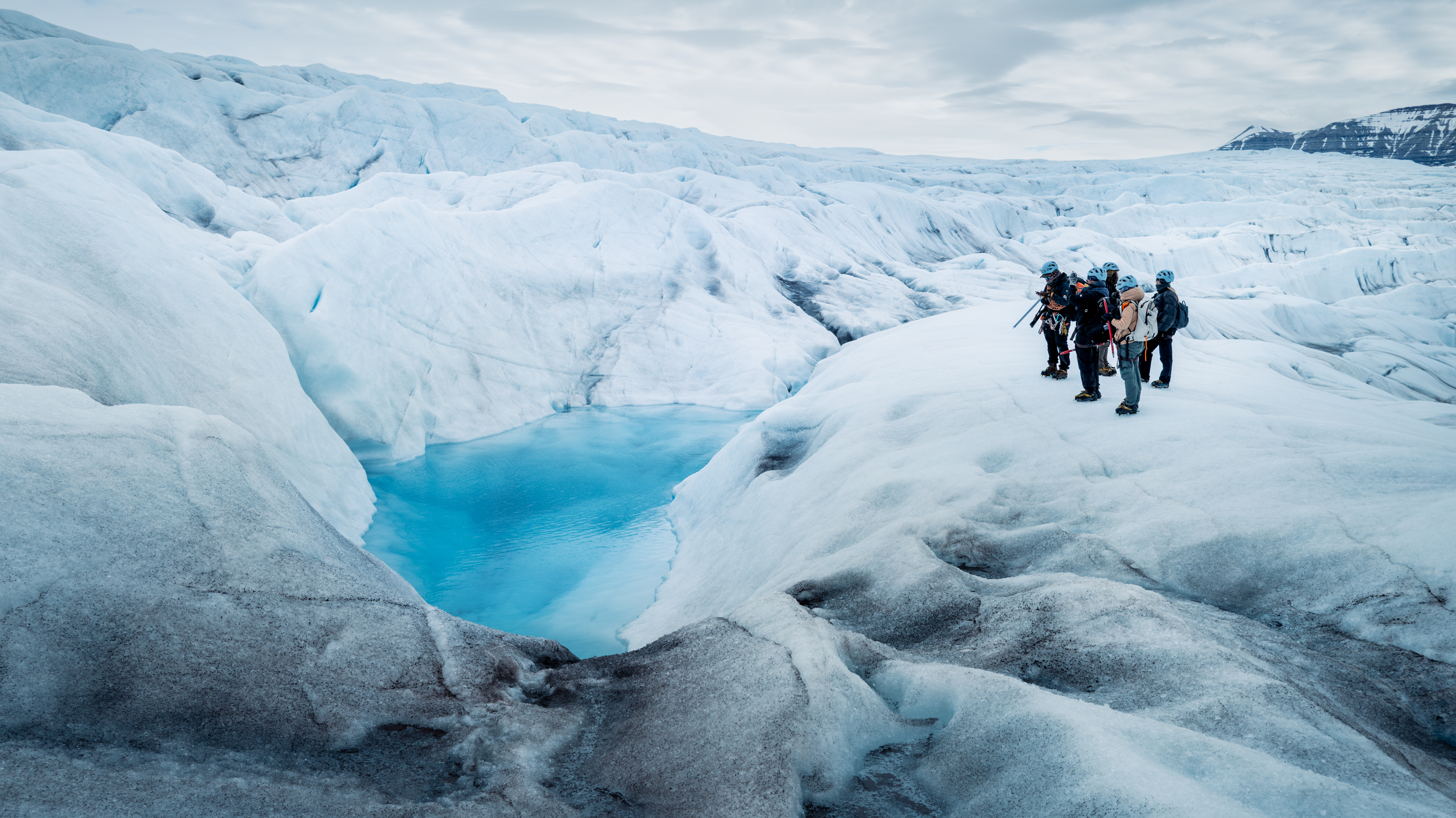 A vivid blue pool on the Nordenski&amp;ouml;ld Glacier, Svalbard