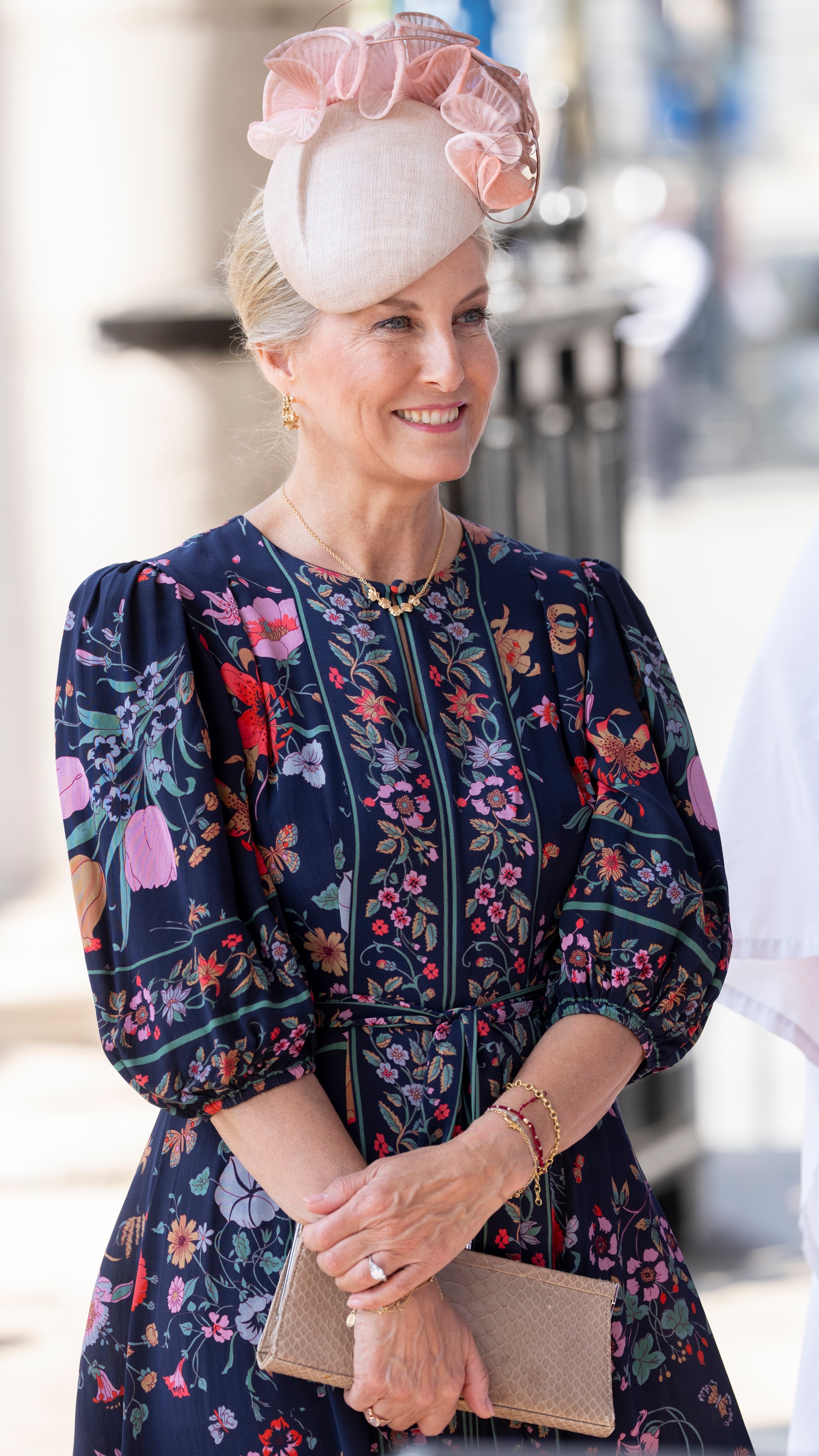 Sophie, Duchess of Edinburgh smiles and holds a clutch bag as she attends a service for the Victoria Cross and George Cross Association at St Martin-in-the-Fields Church on April 30, 2025