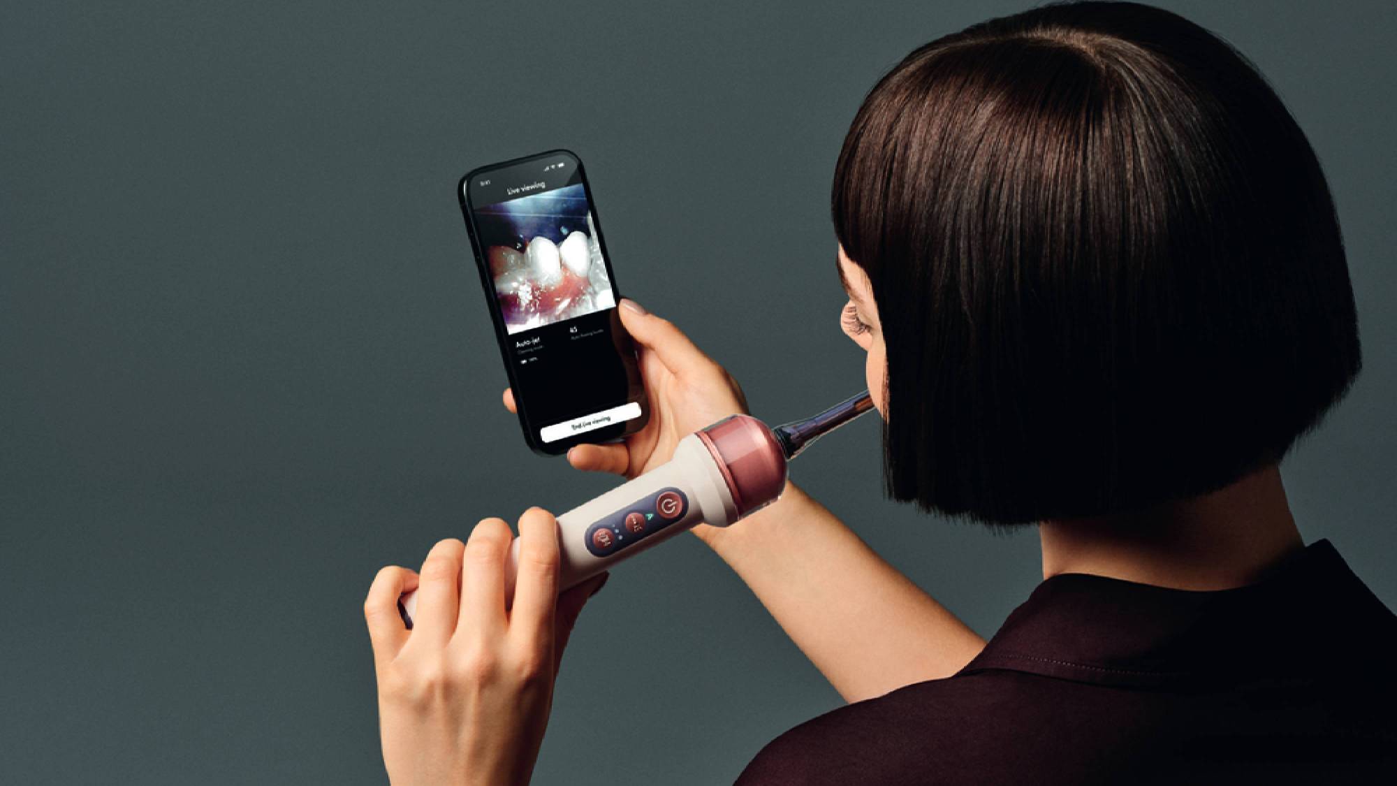 Woman using the Dyson CameraJet 