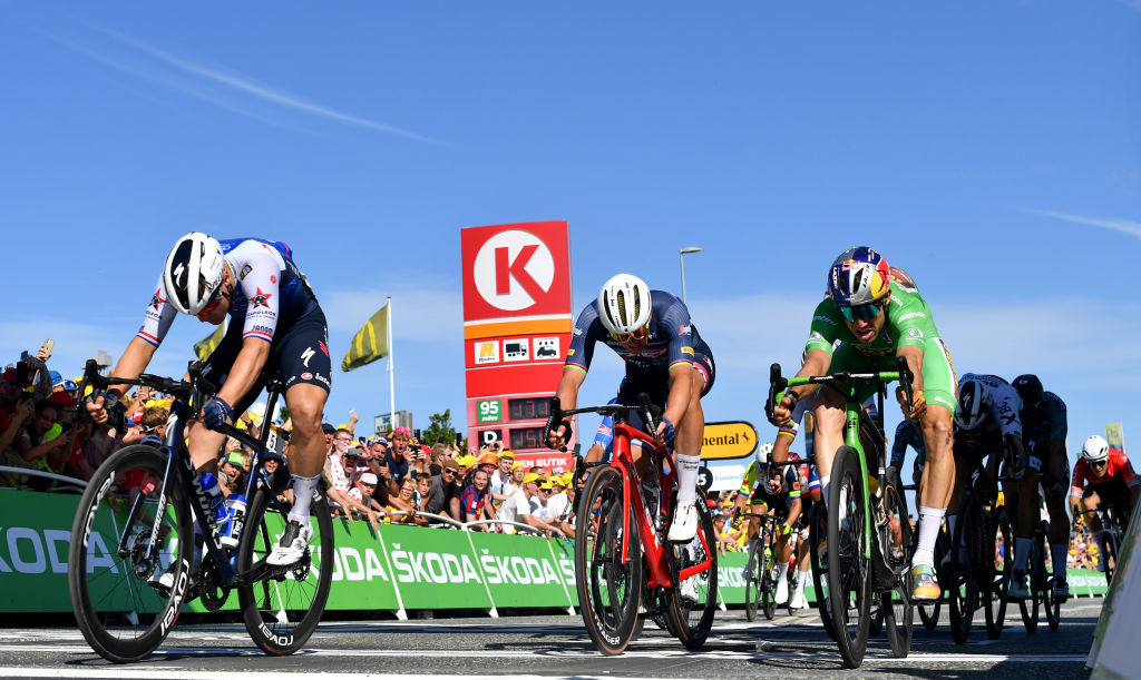 NYBORG DENMARK JULY 02 LR Fabio Jakobsen of Netherlands and QuickStep Alpha Vinyl Team Mads Pedersen of Denmark and Team Trek Segafredo and Wout Van Aert of Belgium and Team Jumbo Visma Green Points Jersey sprint at finish line during the 109th Tour de France 2022 Stage 2 a 2022km stage from Roskilde to Nyborg TDF2022 WorldTour on July 02 2022 in Nyborg Denmark Photo by Stuart FranklinGetty Images