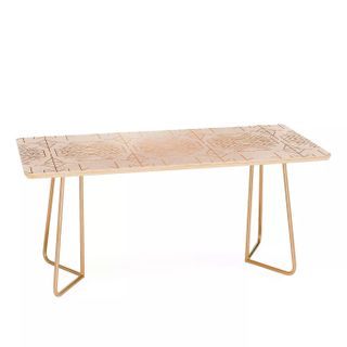 modern coffee table with gold legs