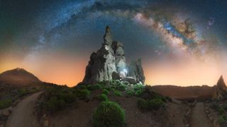 The arch of the Milky Way illuminates Los Roques de García - Teide National Park, Tenerife