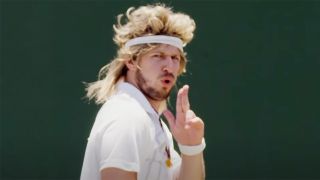 Screenshot from scene of Andy Samberg playing tennis in 7 Days In Hell.