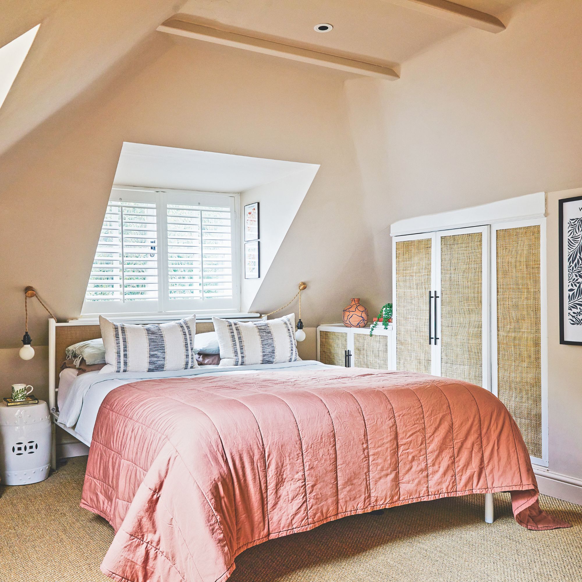 Bedroom in the loft, with dormer window providing additional headspace above the bed