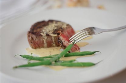 Steak with peppercorn sauce