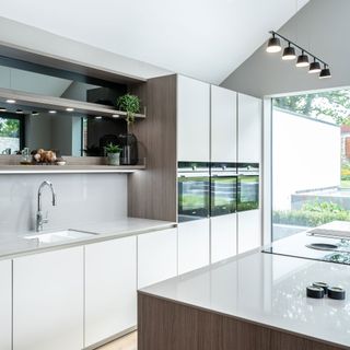 kitchen with white cabinet and butler sink