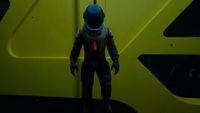 Subnautica 2 trailer still - deep-sea diving suit hanging in front of a yellow wall