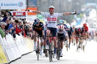 DUNLEPALESTEL FRANCE MARCH 08 Mads Pedersen of Denmark and Team Trek Segafredo celebrates at finish line as stage winner ahead of Wout Van Aert of Belgium and Team Jumbo Visma L and Bryan Coquard of France and Team Cofidis R during the 80th Paris Nice 2022 Stage 3 a 191km stage from Vierzon to DunlePalestel ParisNice WorldTour on March 08 2022 in DunlePalestel France Photo by Bas CzerwinskiGetty Images