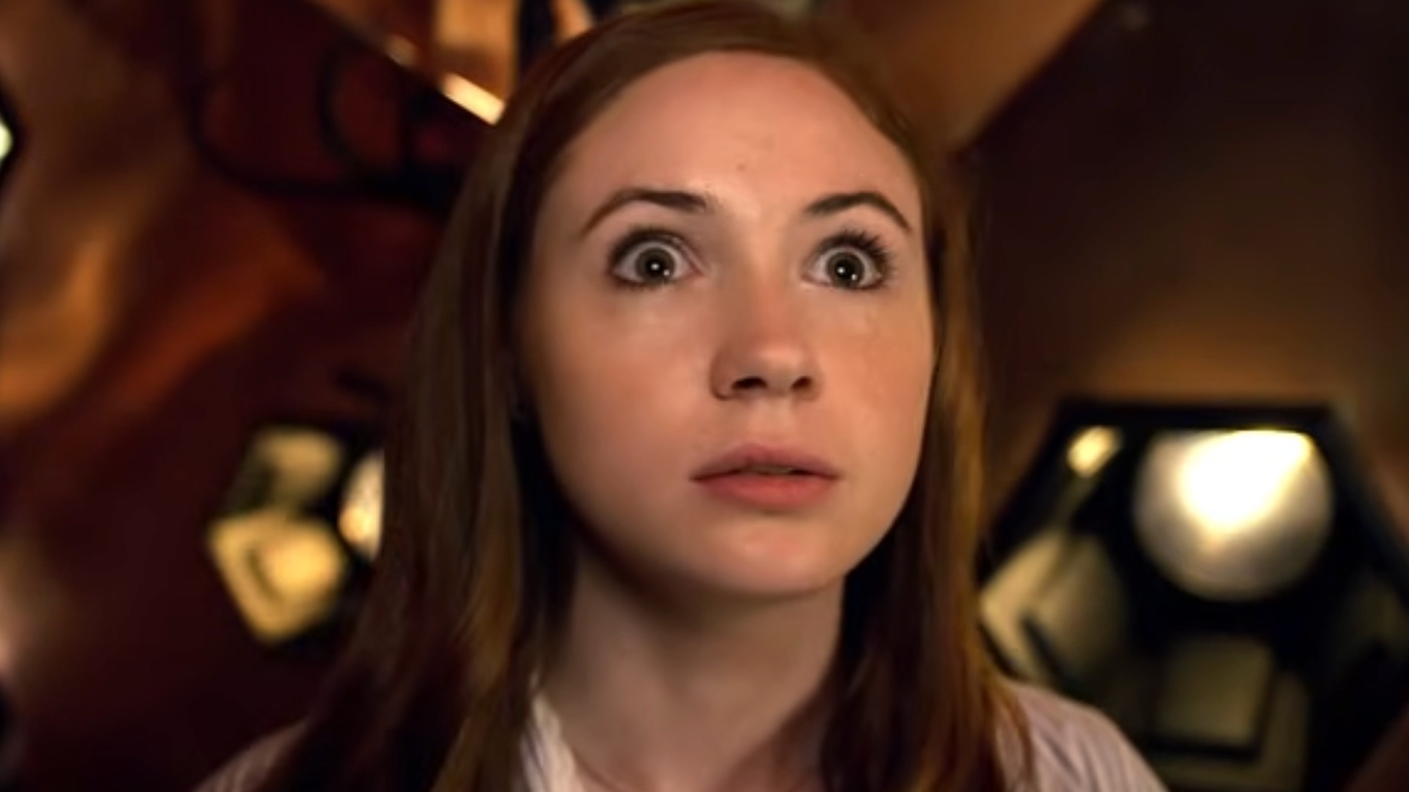 Amy Pond staring wide-eyed in the TARDIS