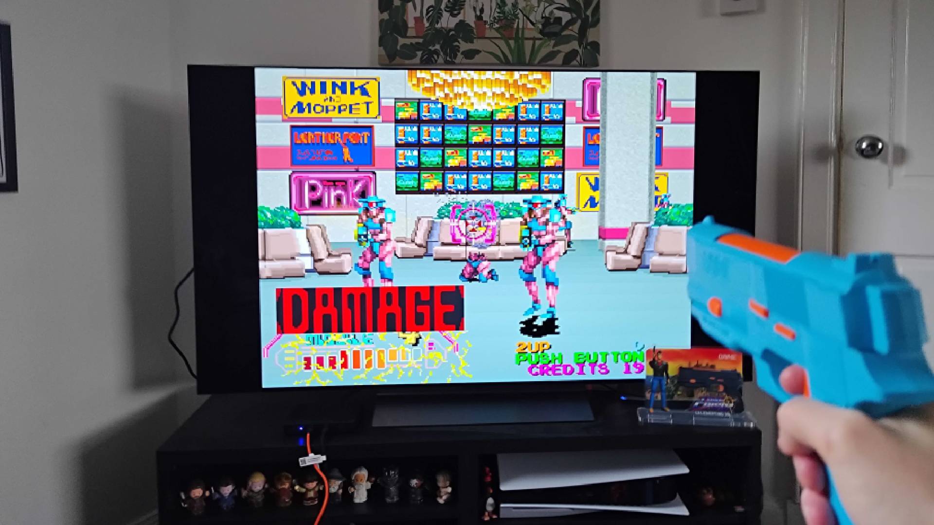 G'AIM'E Lightgun console connected to TV with Steel Gunner gameplay on screen