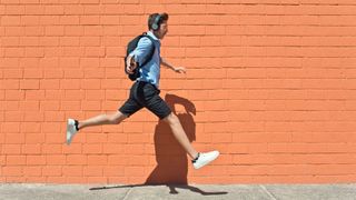 gap year Getty Images man jumping in the street