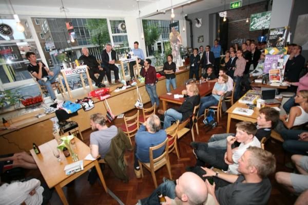 The panel discussion group of Daniel Lloyd, Phil Liggett, Jeremy Whittle and Richard Moore keep the audience entertained.