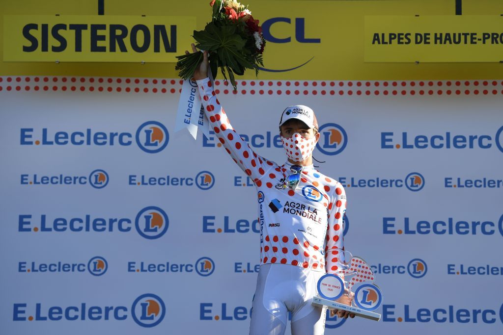 Team AG2R La Mondiale rider Frances Benoit Cosnefroy celebrates his best climbers polka dot jersey on the podium at the end of the 3rd stage of the 107th edition of the Tour de France cycling race 198 km between Nice and Sisteron on August 31 2020 Photo by Stuart Franklin various sources AFP Photo by STUART FRANKLINAFP via Getty Images