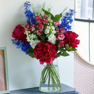 Coronation flower display red white and blue