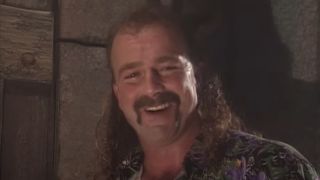 Jake "The Snake" Roberts laughing after betraying Ultimate Warrior