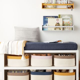 https://www.containerstore.com/s/marie-kondo-collection/shop-by-category/kids-organization/marie-kondo-wheat-yellow-kid's-wall-mall_mounted-bookshelf/123d?productId=11014889