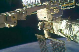 NASA astronauts Chris Cassidy and Bob Behnken conduct a spacewalk to replace batteries outside of the International Space Station on Wednesday, July 1, 2020.