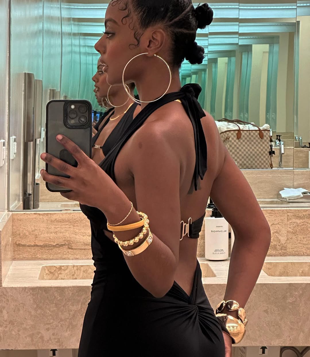woman wearing a dress in a mirror