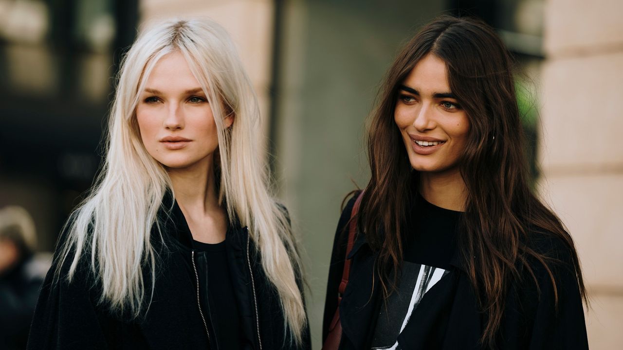 women with detangled hair wearing black jackets