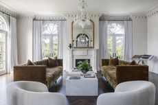 twin sofas and armchair in living room