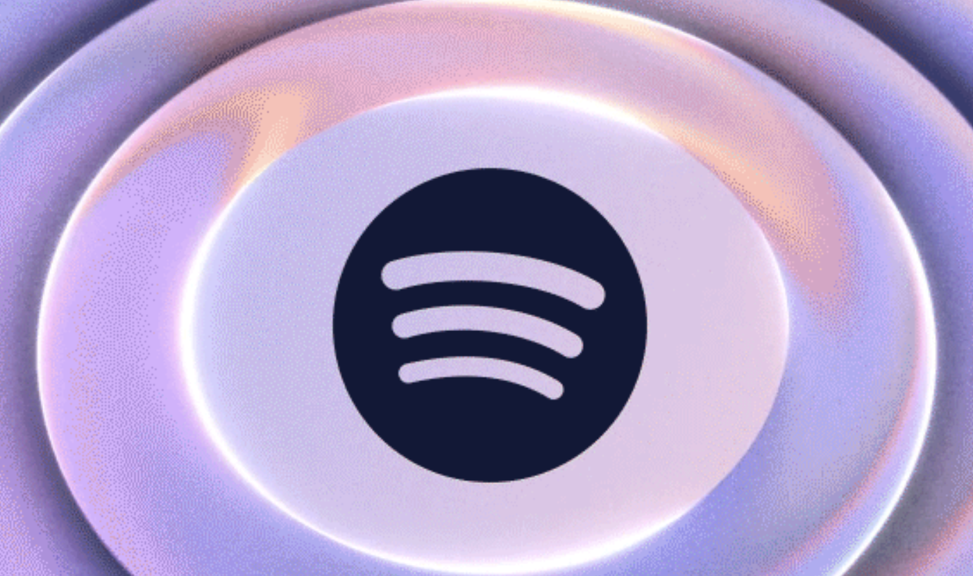 The Spotify logo in deep purple, surrounded by lilac rings to denote Lossless audio 