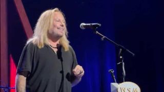 Vince Neil onstage at the Grand Ole Opry