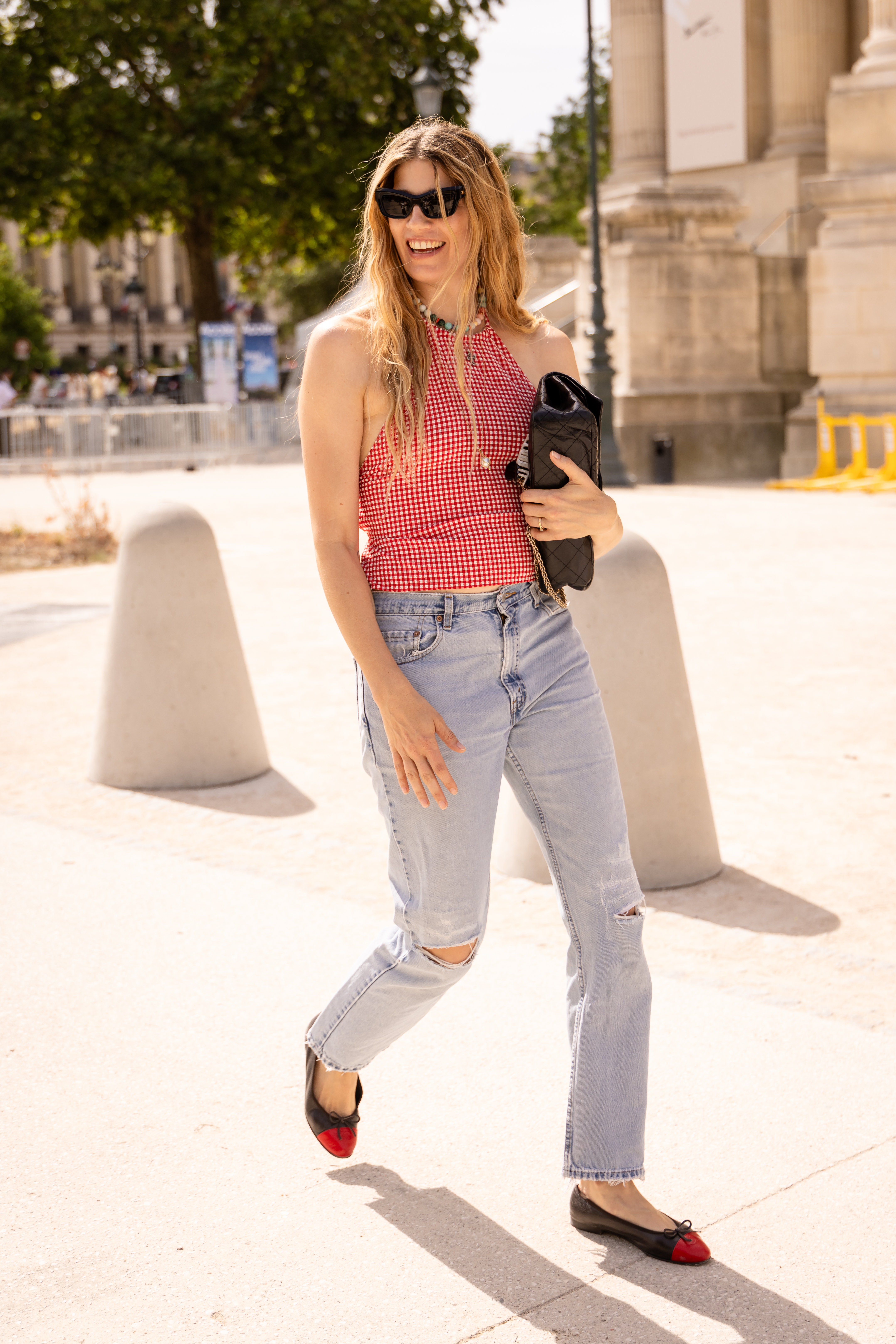 Woman wearing a Paris Haute Couture Week outfit.