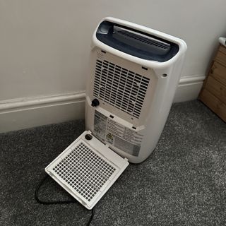 The white De’Longhi Tasciugo AriaDry Multi Dehumidifier with air filter removed
