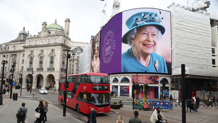 queen elizabeth on a billboard in london for platinum jubilee 2022