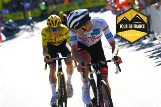 ALPE D'HUEZ, FRANCE - JULY 14: (L-R) Jonas Vingegaard Rasmussen of Denmark and Team Jumbo - Visma Yellow Leader Jersey and Tadej Pogacar of Slovenia and UAE Team Emirates white best young jersey compete during the 109th Tour de France 2022, Stage 12 a 165,1km stage from BrianÃ§on to L'Alpe d'Huez 1471m / #TDF2022 / #WorldTour / on July 14, 2022 in Alpe d'Huez, France. (Photo by Tim de Waele/Getty Images)