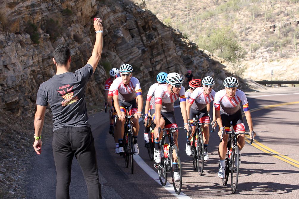 Polartec-Kometa riders get a snack as they climb up Mt. Lemmon outside of Tucson