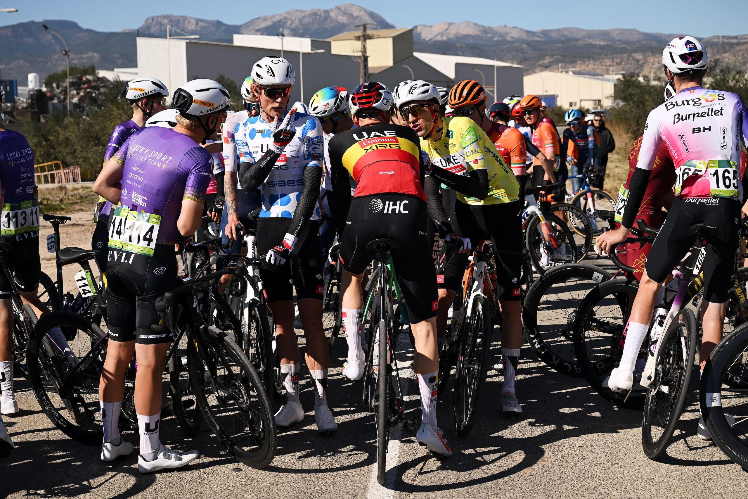 Riders blown off the road as high speed winds disrupt stage racing across Spain