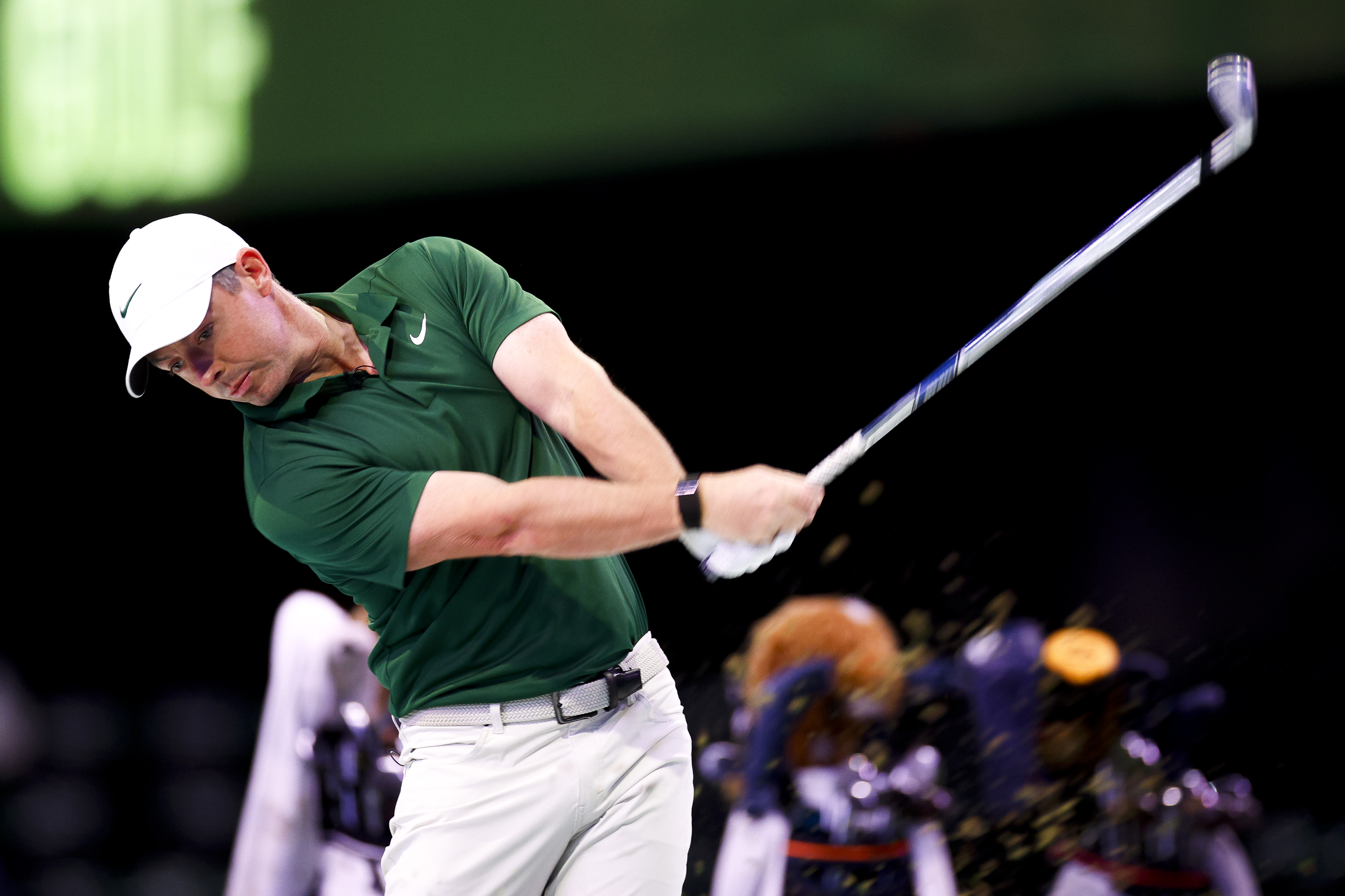 Rory McIlroy hits an iron shot during a TGL match in January 2026