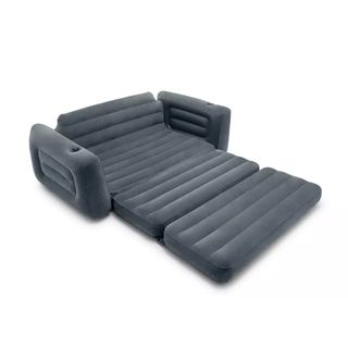 A grey inflatable sofa that transforms into an air bed