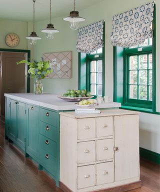 Green country kitchen with island