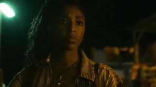 Jessica Williams looking serious in Road House