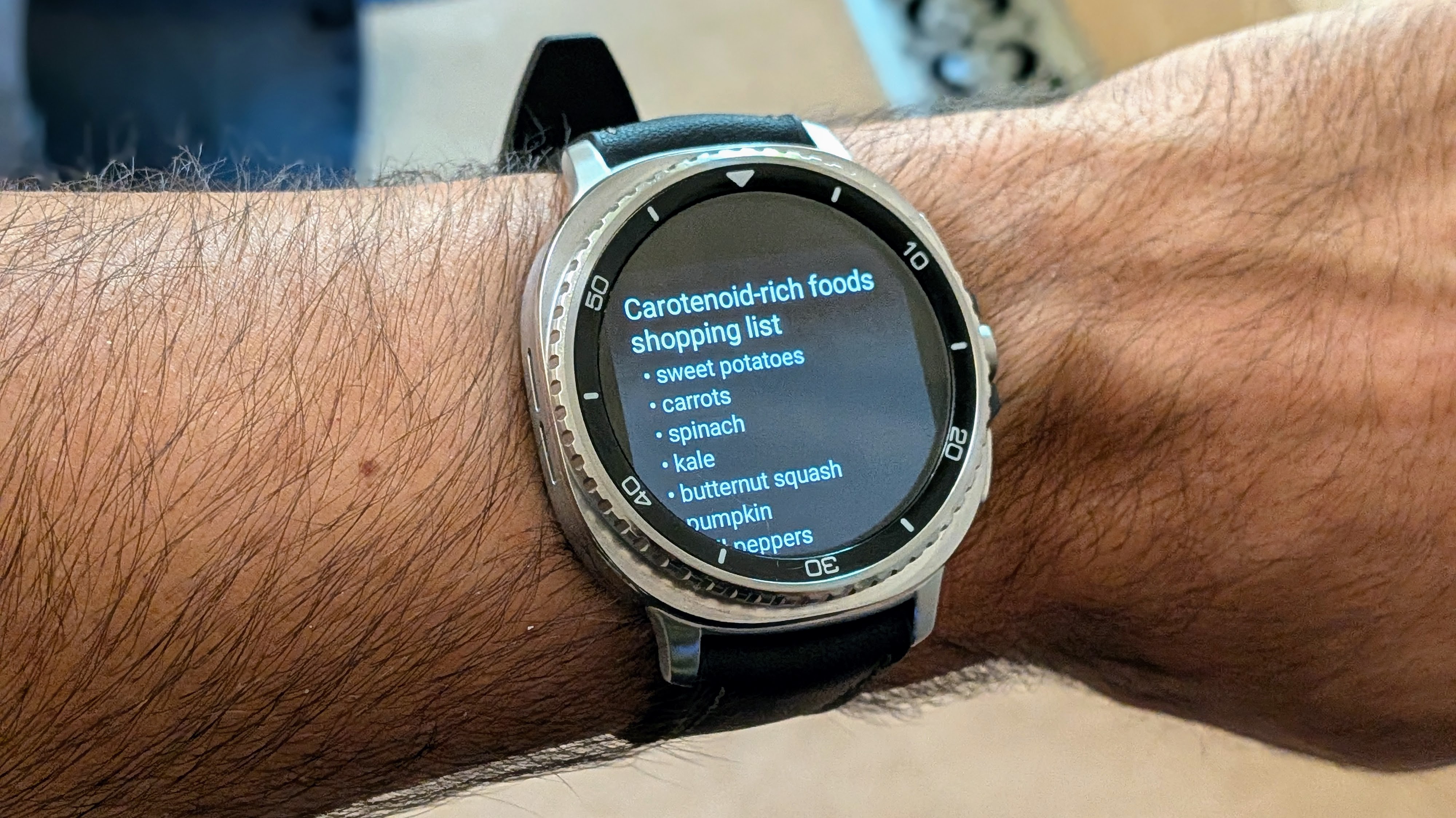 The Samsung Galaxy Watch 8 Classic showing a Gemini-created carotenoid-rich foods list added to Google Keep.