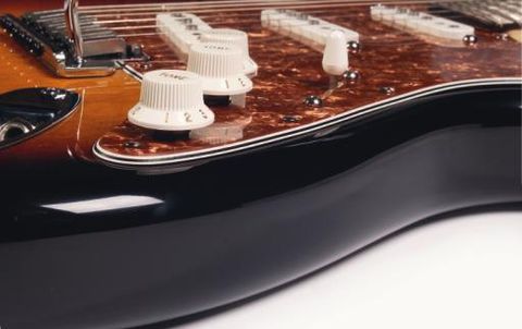 Two pull/push pots open up five new tones on your Strat.