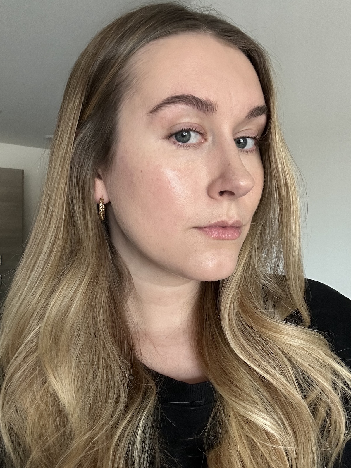 Kaitlyn McLintock tests Burt's Bees Original Beeswax Lip Balm.