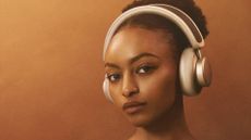 Urbanista Los Angeles review: woman wearing gold headphones