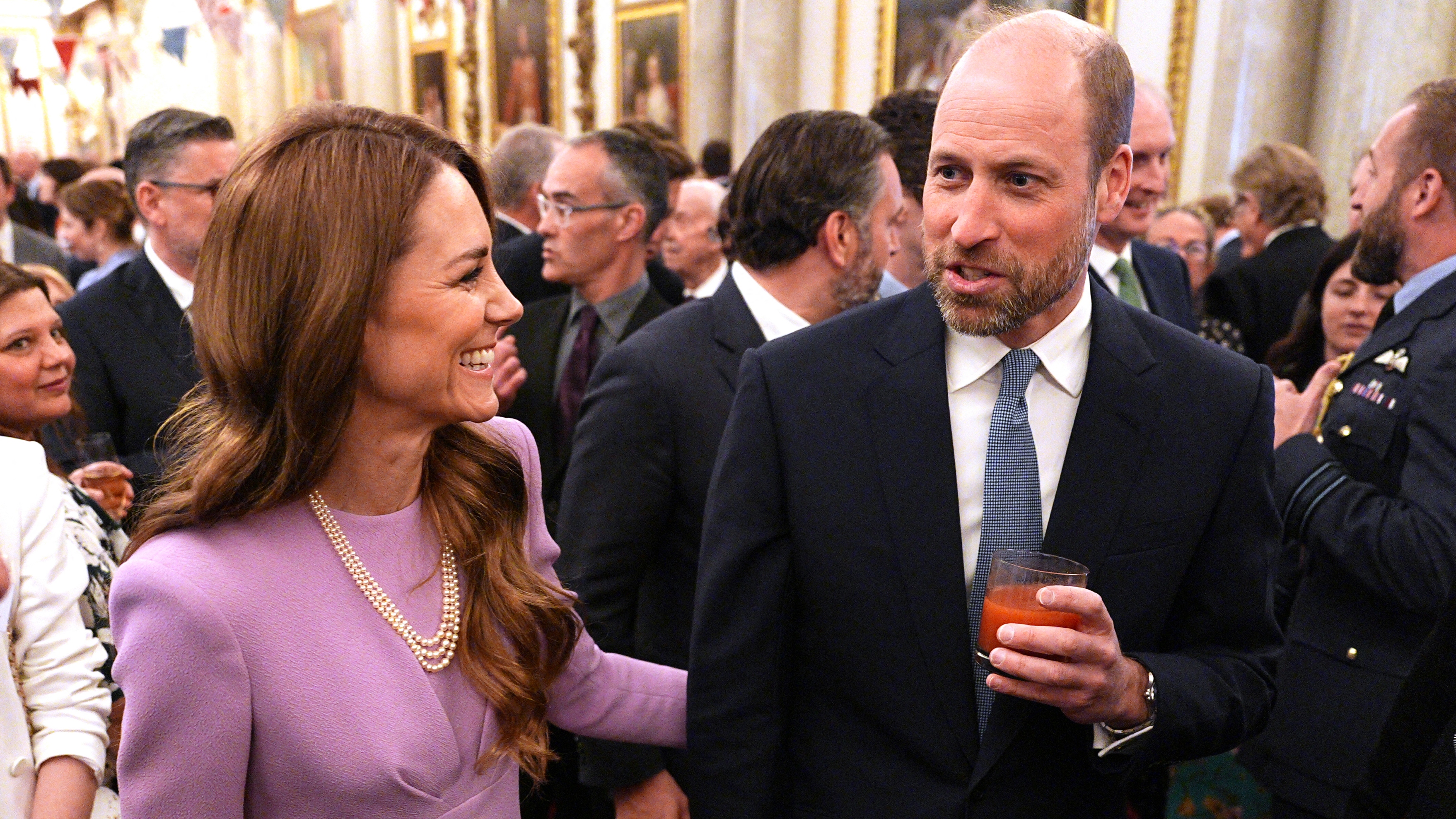 Catherine, Princess of Wales and Prince William attend a reception to celebrate the life of the late Queen Elizabeth II at Buckingham Palace in central London on April 21, 2026