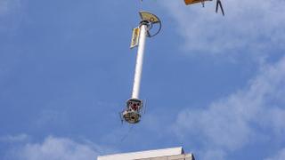 Lifting the new Dielectric Antennas into place involved closing more than a dozen city streets and was one of the project’s most demanding aspects.