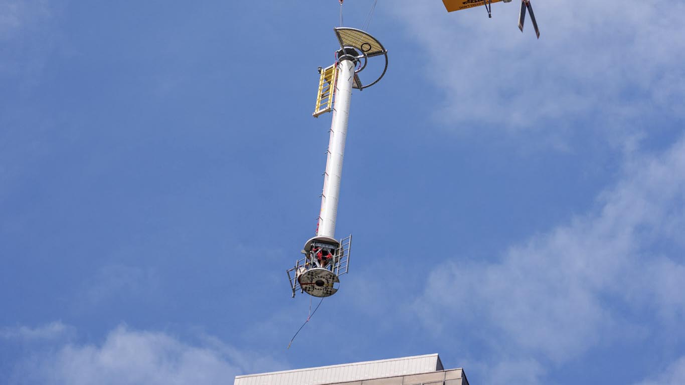 Lifting the new Dielectric Antennas into place involved closing more than a dozen city streets and was one of the project&rsquo;s most demanding aspects. 