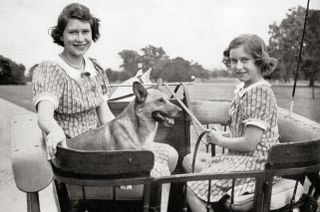 Princess Elizabeth, future Queen Elizabeth II, left, and Princess Margaret, right, driving a pony and trap in Great Windsor Park, England