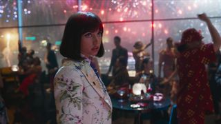 Ana de Armas' Dani Miranda talks to Ryan Gosling's Sierra Six, who is seated off camera, in Netflix's The Gray Man