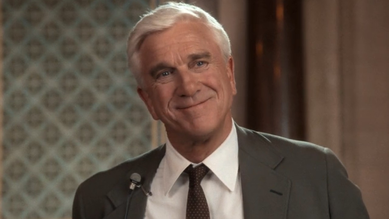 Leslie Nielsen smiling. 