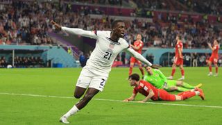 Timothy Weah celebrating the USA's goal against Wales
