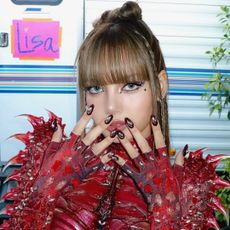 Lalisa wearing nails designed by celebrity manicurist Juan Alvear.