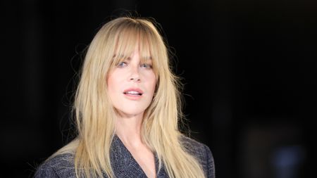 Nicole Kidman posing with straight hair at the Chanel Womenswear Spring/Summer 2027 show in Paris. 